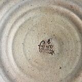 Emailed sandstone plate
