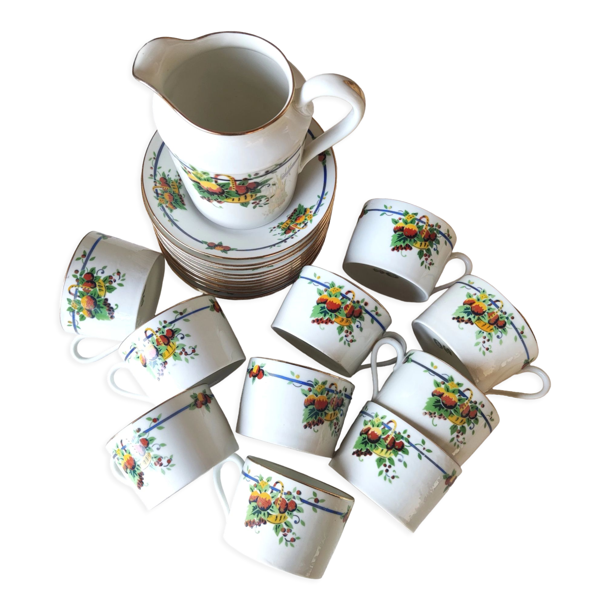 10 tea cups and creamer in Limoges porcelain