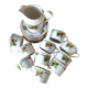 10 tea cups and creamer in Limoges porcelain