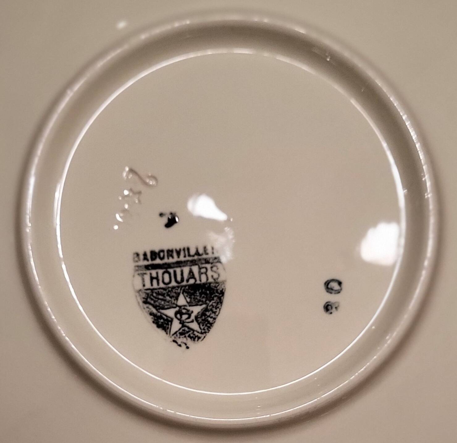 Round service plate demi-void signed Badonviller Thouars Art Deco