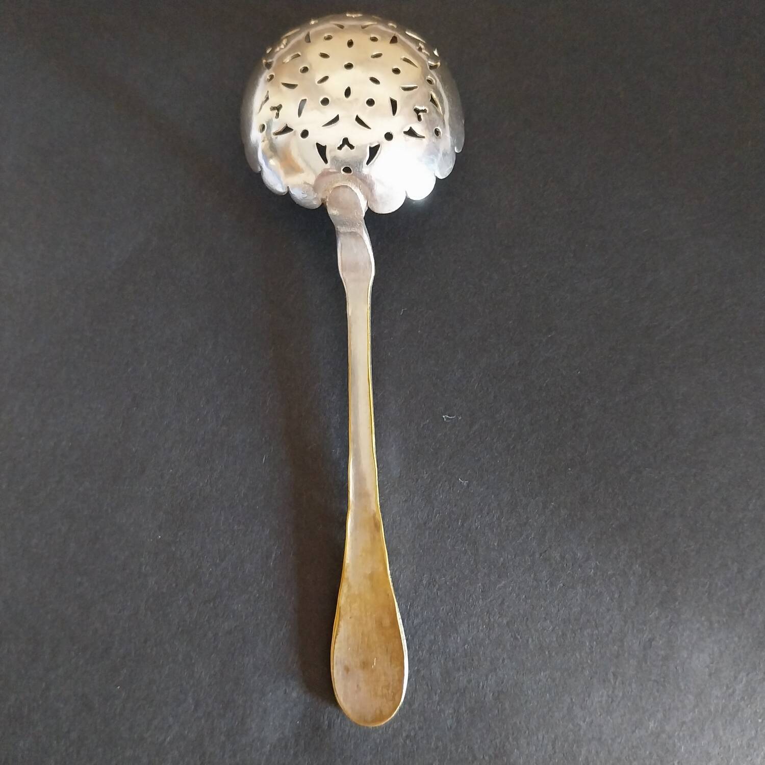 Antique silver metal shaker