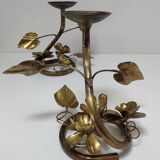 Pair of brass candle holders decorated with patinated metal flowers