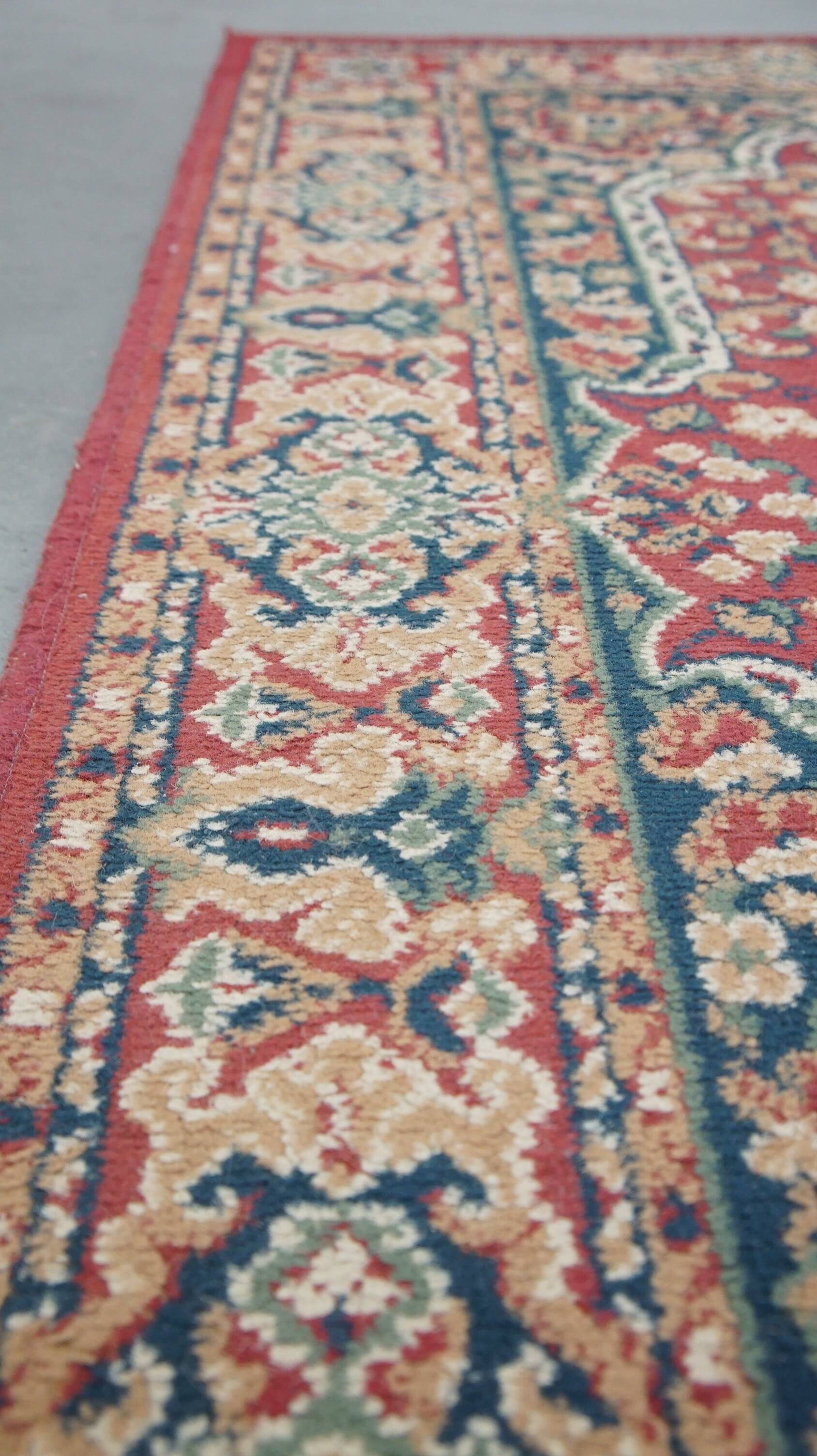 Vintage oriental rug with predominantly red, cream, and beige colors, measuring 168x120 cm