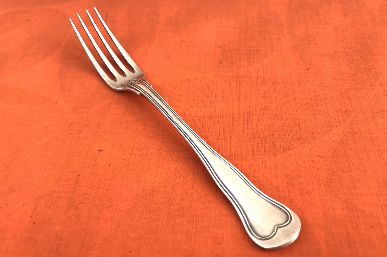 Antique dessert fork by silversmith Christofle, Chinon model collection.