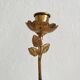 Antique bronze and brass candlestick with golden leaves