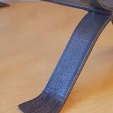 Brutalist magazine rack in forged steel, 1950.