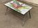 Table basse rectangulaire vintage en céramique incrustée de fleurs et acier