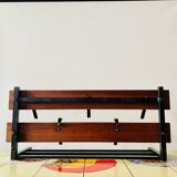 Vintage wall-mounted coat rack in wood and black metal