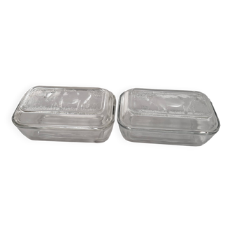 Two Arcoroc glass dairy cow butter dishes