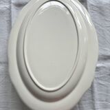 Oval serving dish in earthenware.