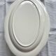 Oval serving dish in earthenware.