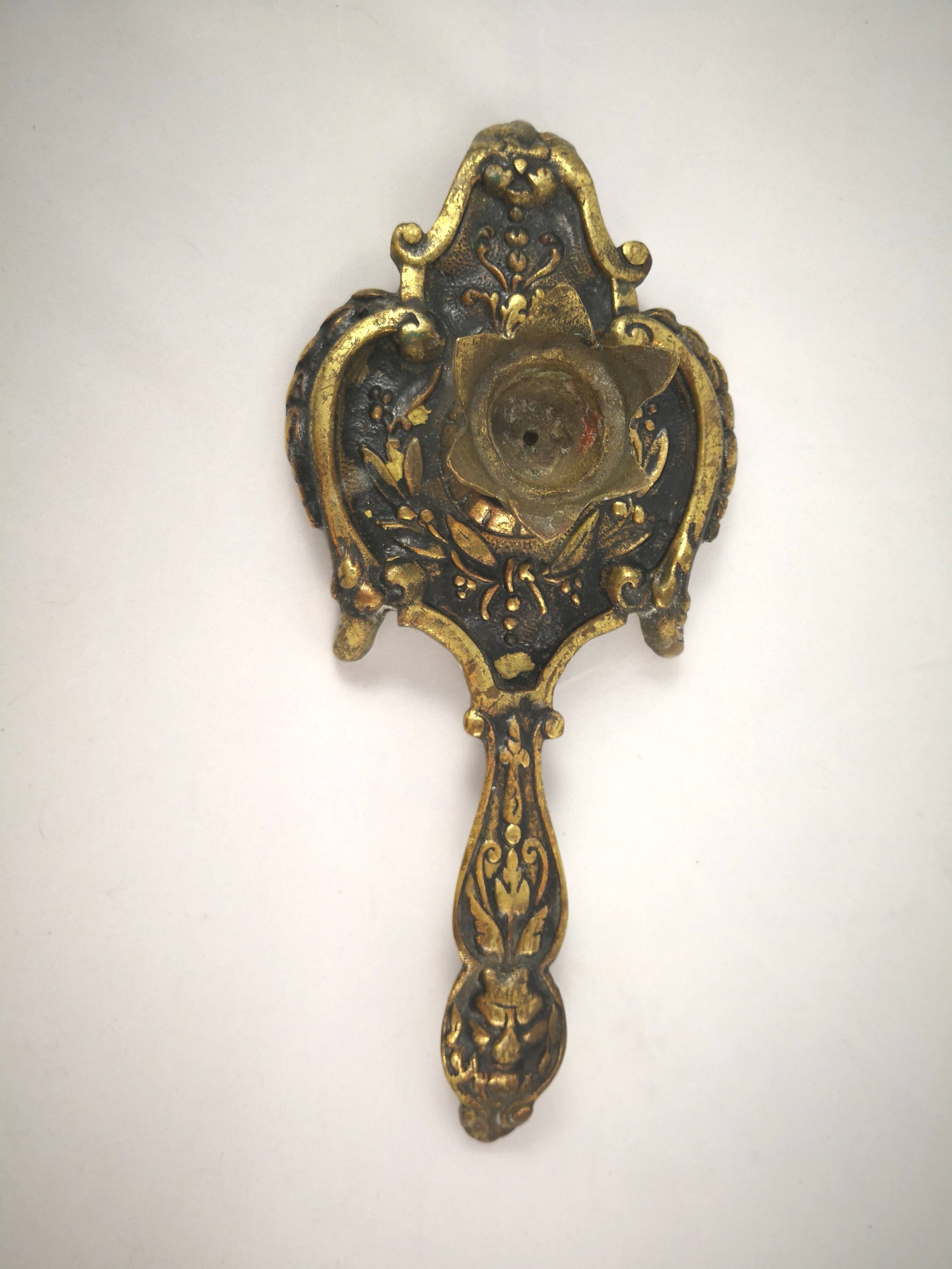 bronze or brass candle holder, cellar level