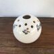 Ancient ball vase with 13 holes in ceramic with painted decoration