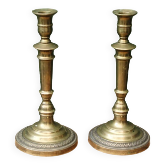 Pair of guilloché bronze candlesticks