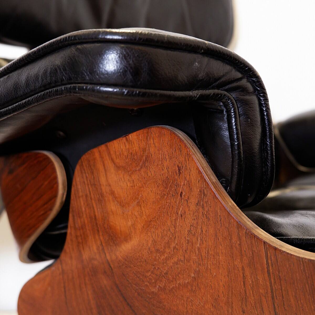 Mid-Century armchair and footrest by Charles & Ray Eames for Herman Miller