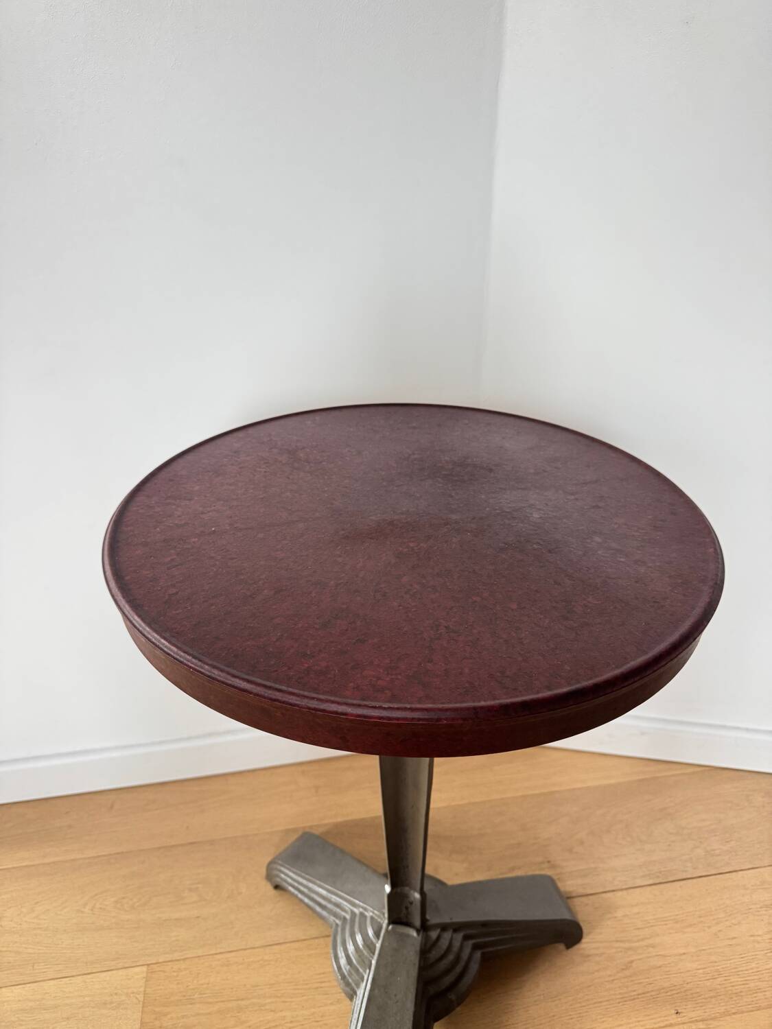 Rare Louis Vuitton cast iron bistro table with a bakelite top.