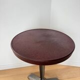 Rare Louis Vuitton cast iron bistro table with a bakelite top.