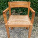 Brutalist chair in solid pine with a straw seat from the 1970s.