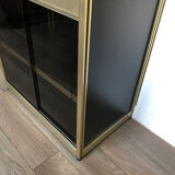 Shelves of black and gold windows