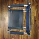 Black leather cantilever armchair