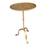 Minimalist brutalist gold metal pedestal table