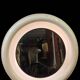 1970s mirror with integrated lighting, futuristic design, vintage wood.