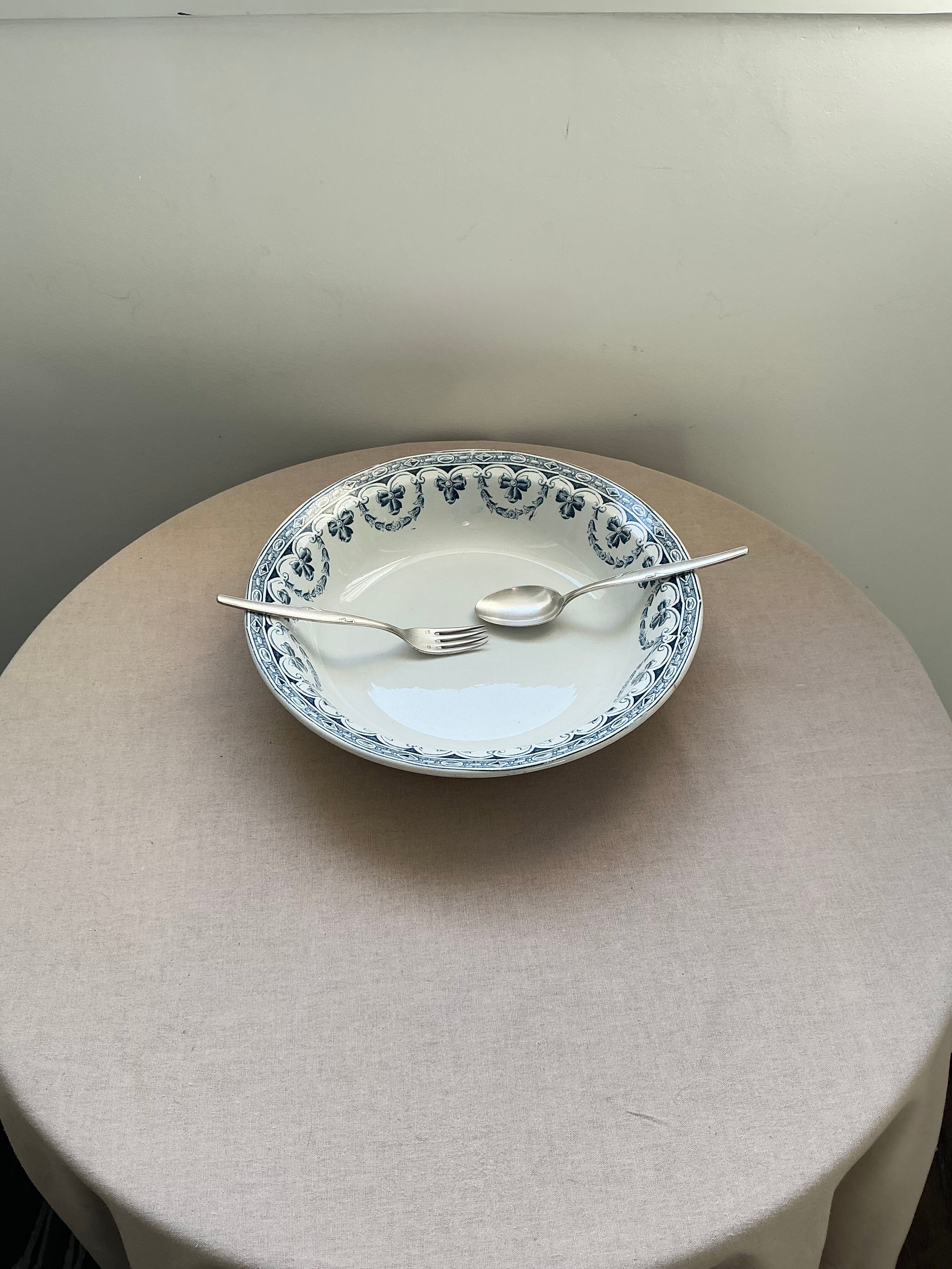 Old hollow dish in Ironstone with blue decoration by Amand & Hamage Santiago.