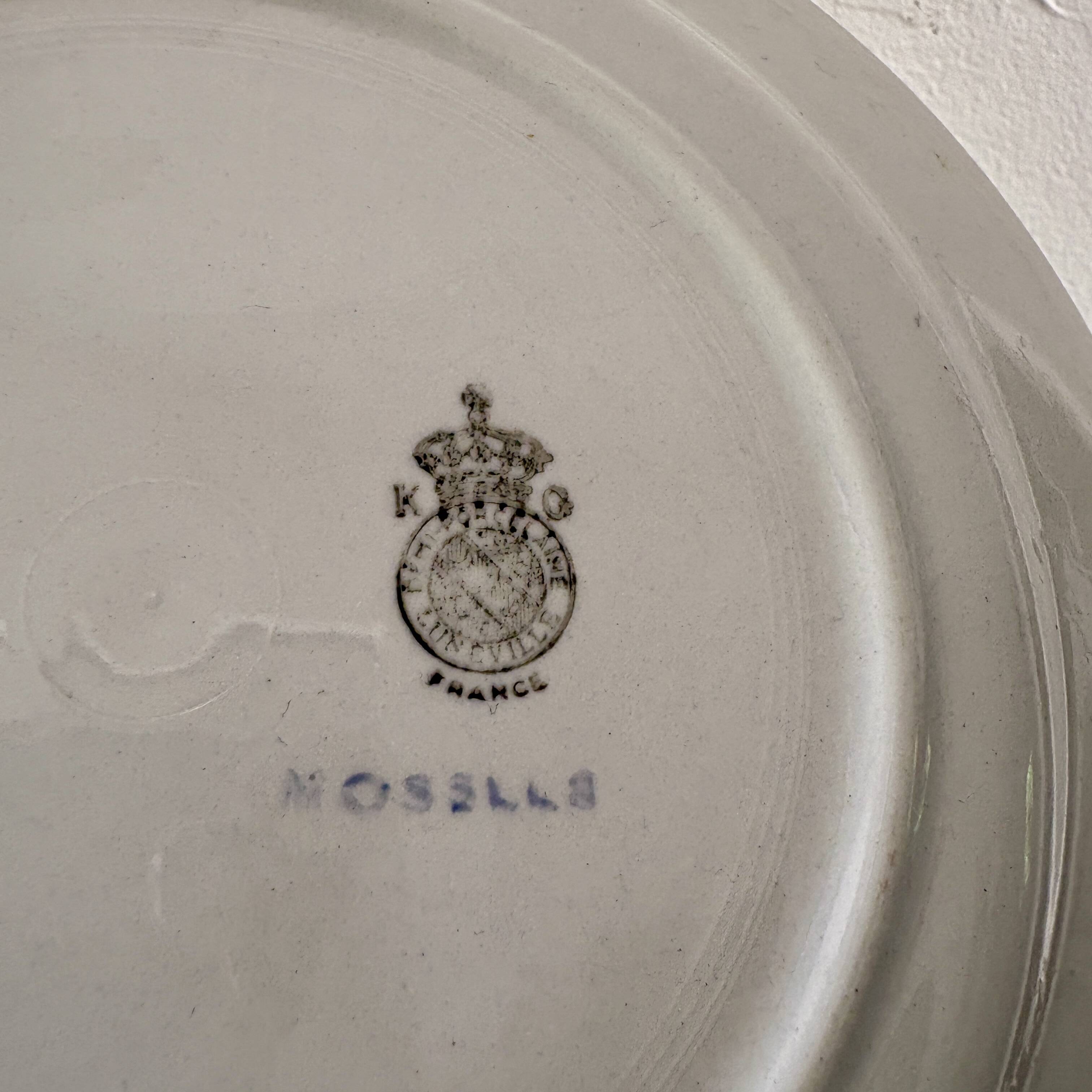 Set of 12 white, mint and gold flat plates, Mosèle de Lunéville