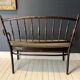 Thonet-branded bistro-style bench in turned wood, velvet and caning