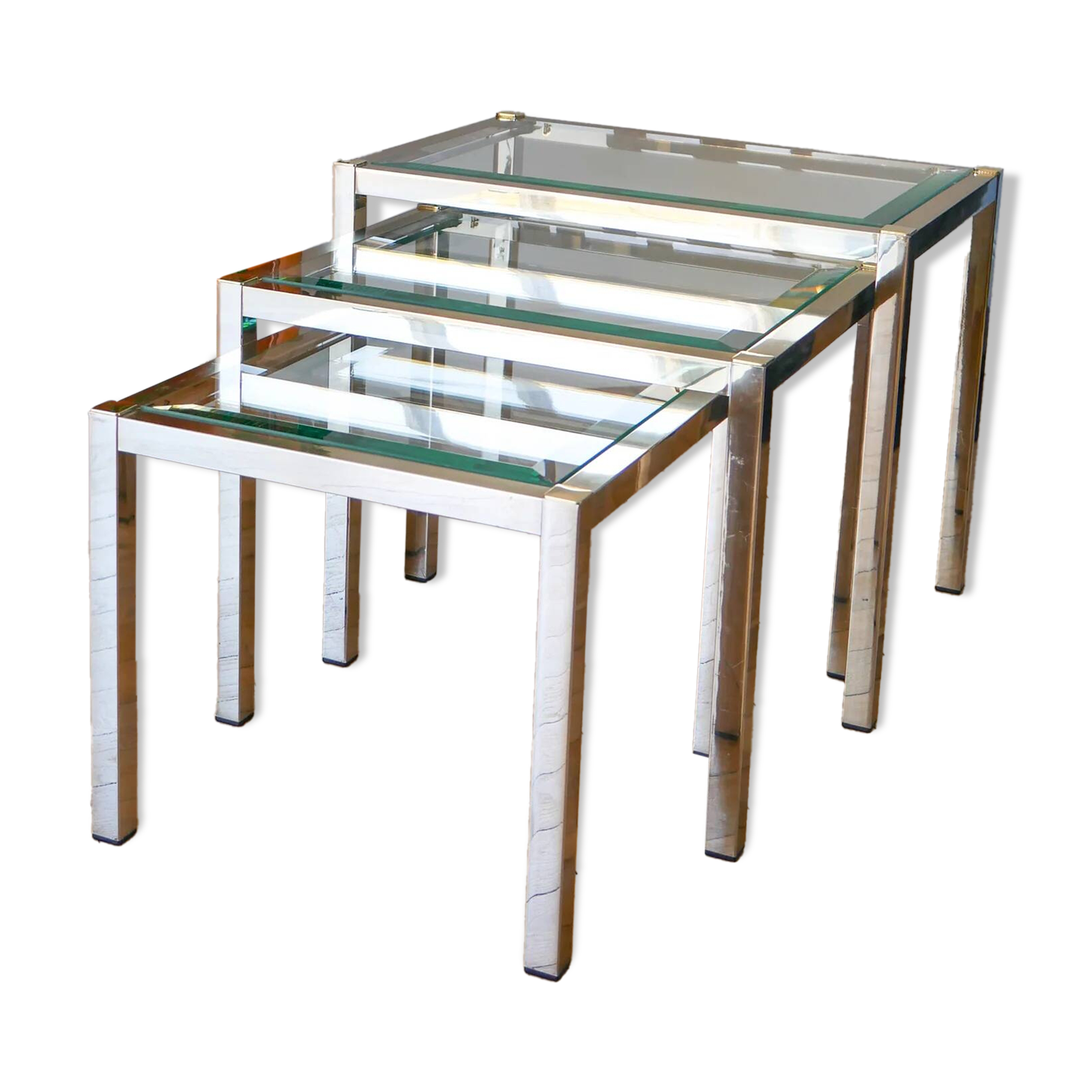 Set of three nesting coffee tables, gilt brass with beveled glass tops, 1980