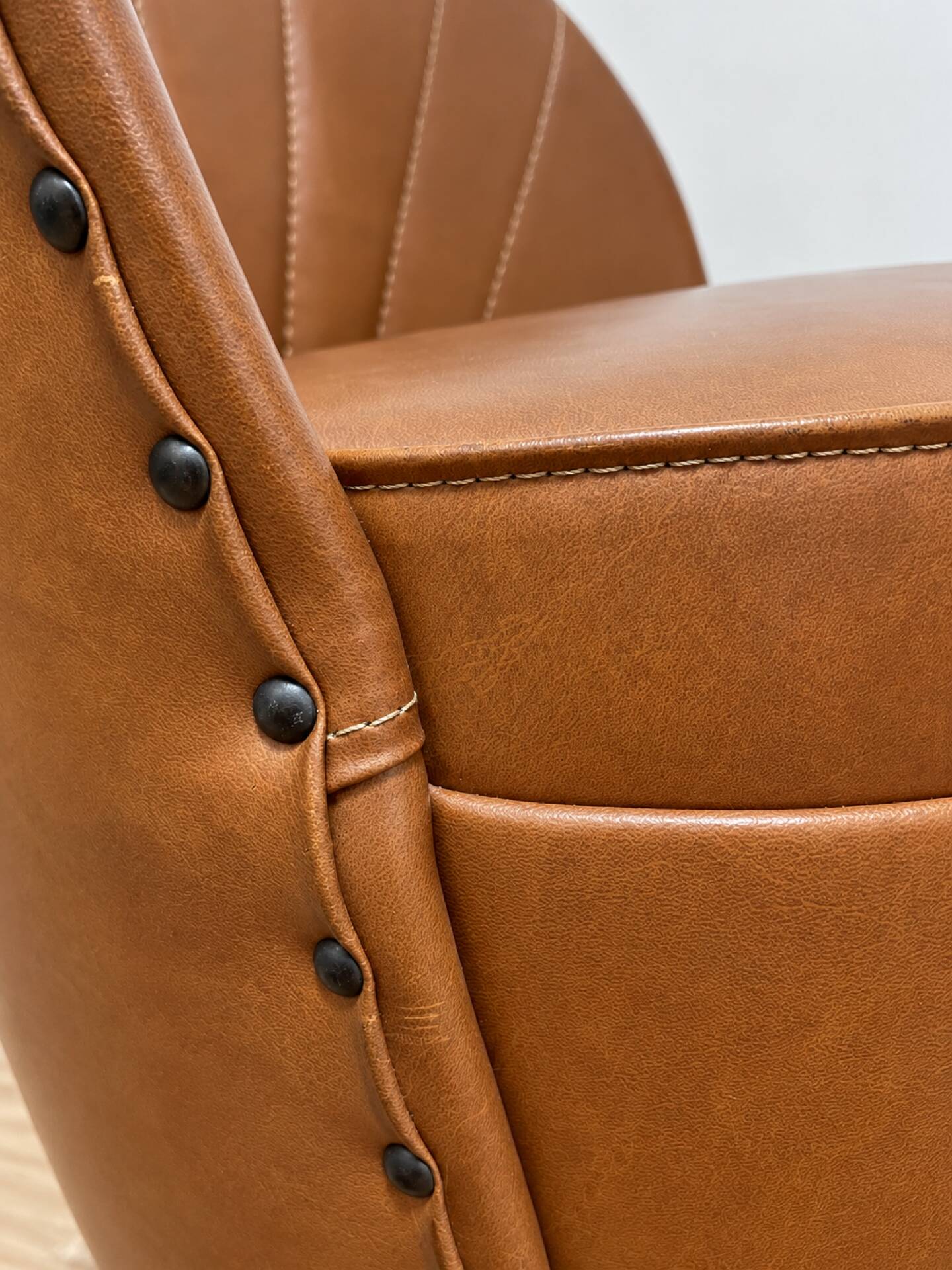 Vintage cognac fringe tub chairs