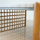 Table basse en travertin et en rotin
