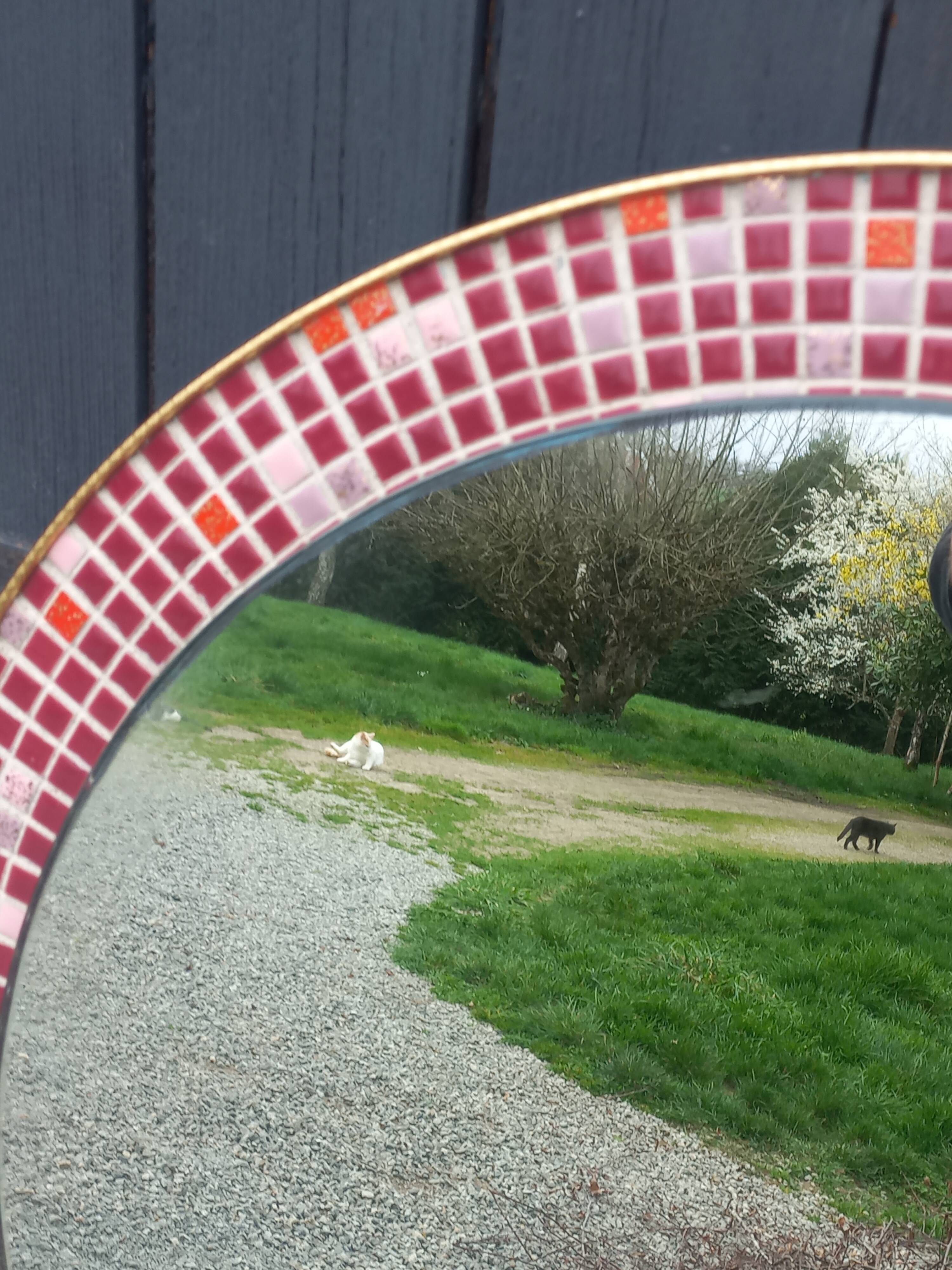 Vintage ceramic mirror from the 1960s.