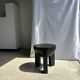 Black mango wood tripod side table with a semi-spherical top, height: 45 cm, diameter: 44 cm.
