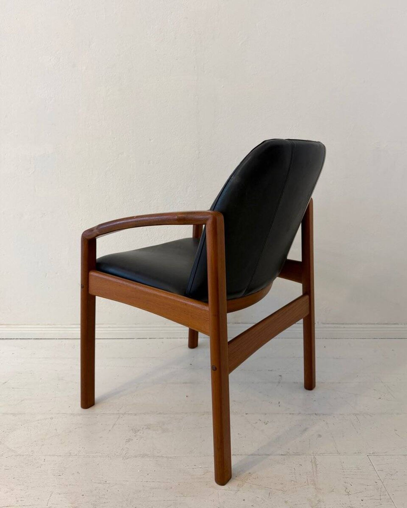 Mid-century modern chair in teak and black leather, Germany, 1960s