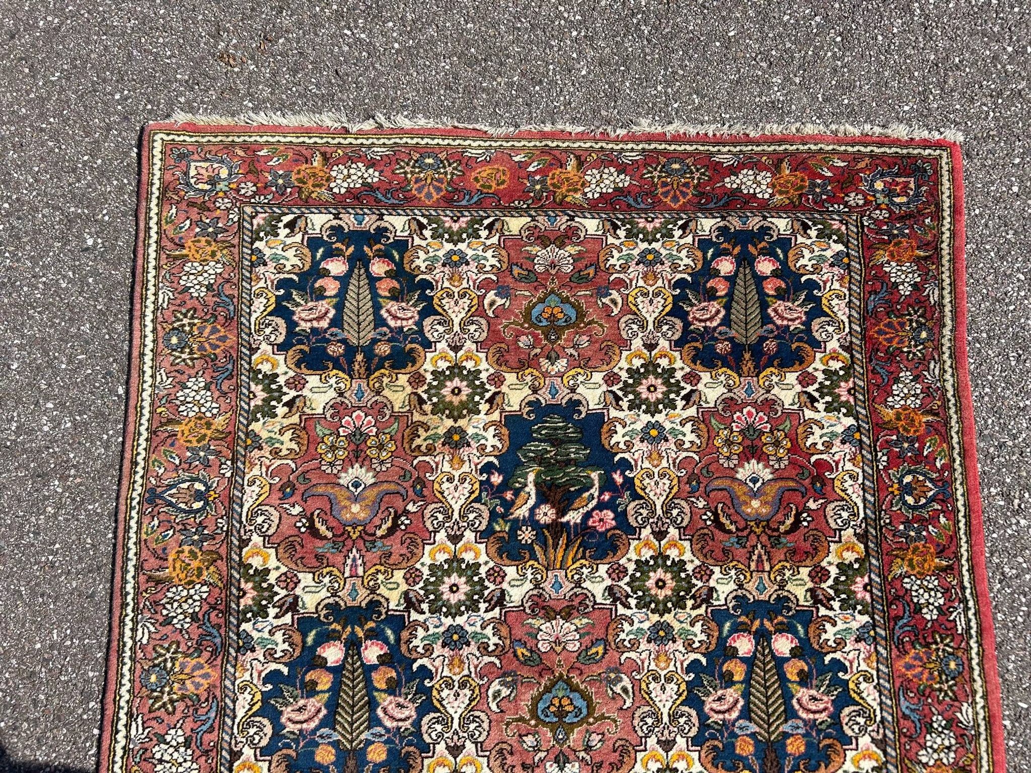 tapis d'orient à décor d'oiseaux 150/205cm