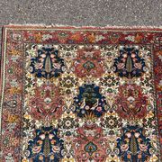 tapis d'orient à décor d'oiseaux 150/205cm