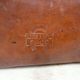 Old monogrammed leather travel suitcase and barony crown