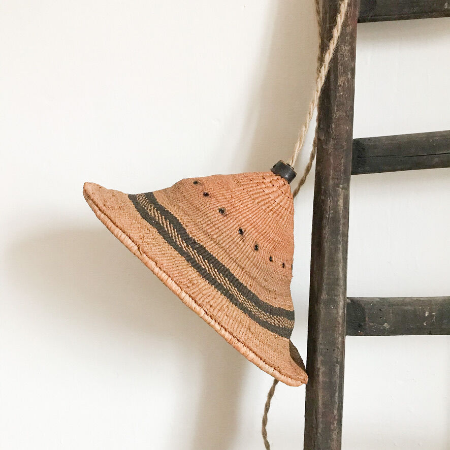 African hat walking lamp