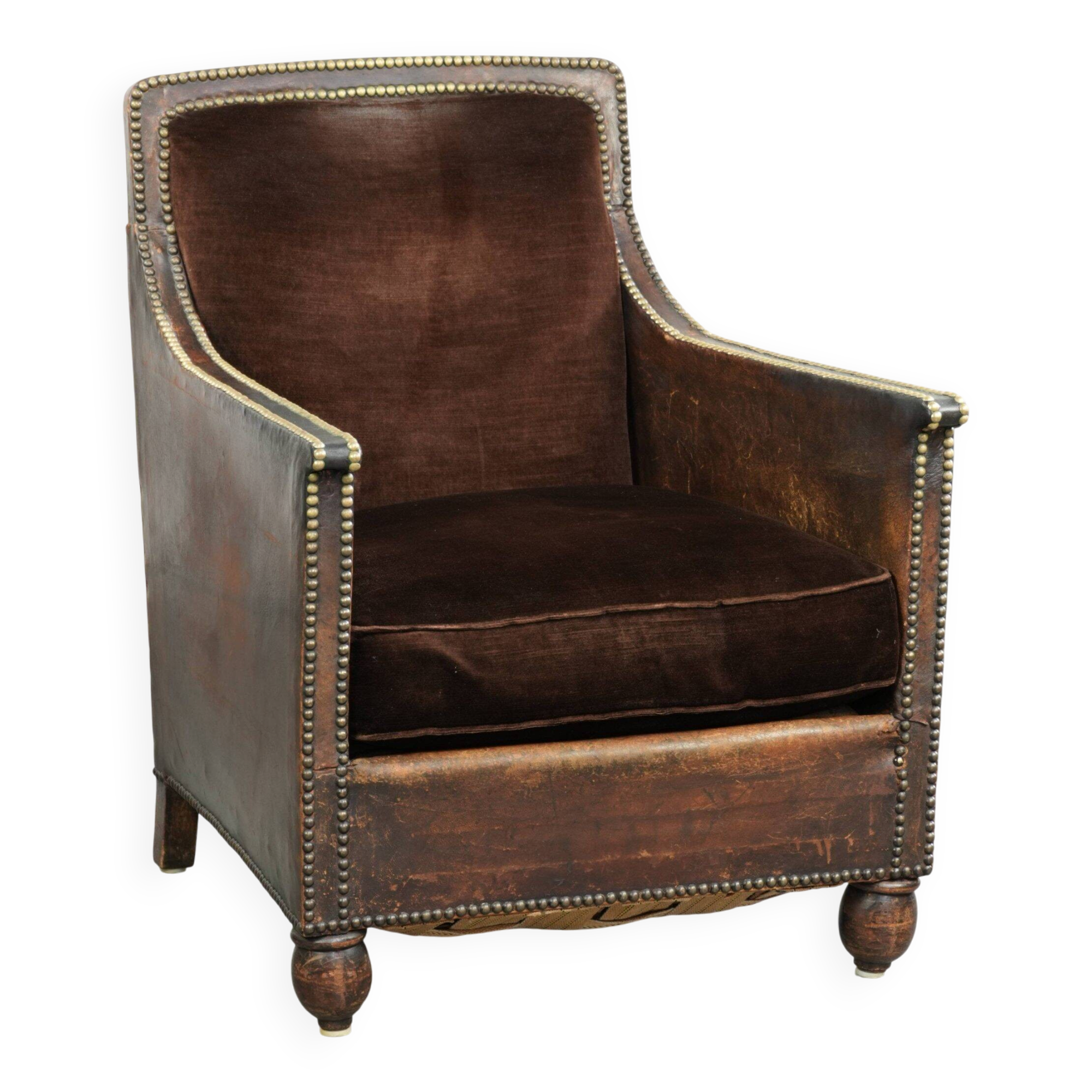Art Deco design armchair finished in velvet and fitted with decorative nails