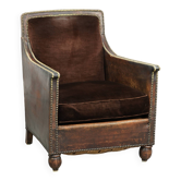 Art Deco design armchair finished in velvet and fitted with decorative nails
