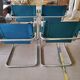 4 vintage Italian armchairs in green leather and chrome metal.