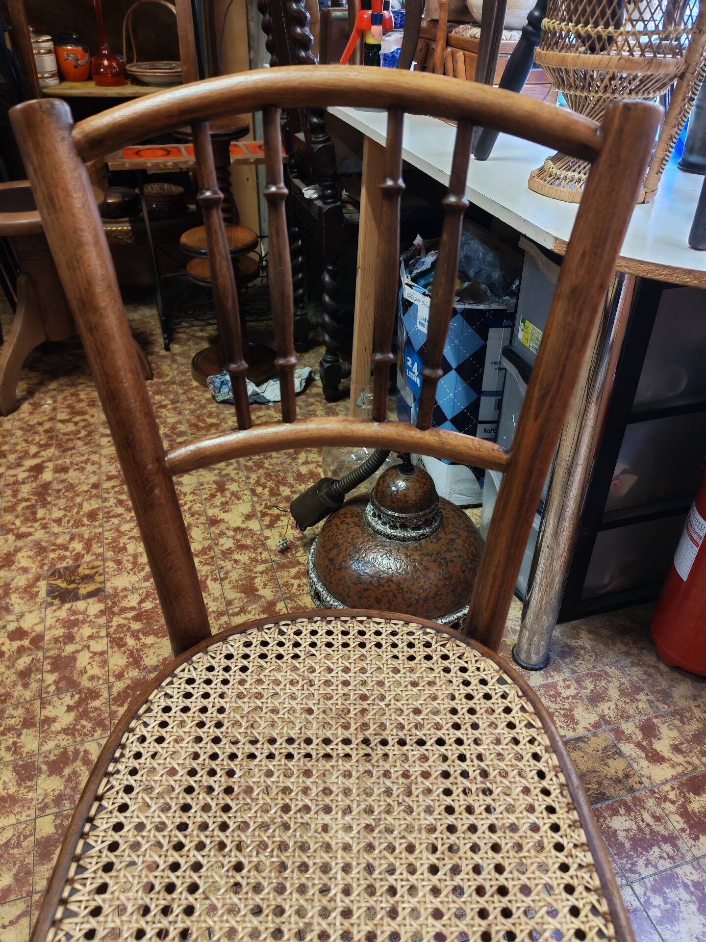 Bistro chair in wood and caning from the 1900s.