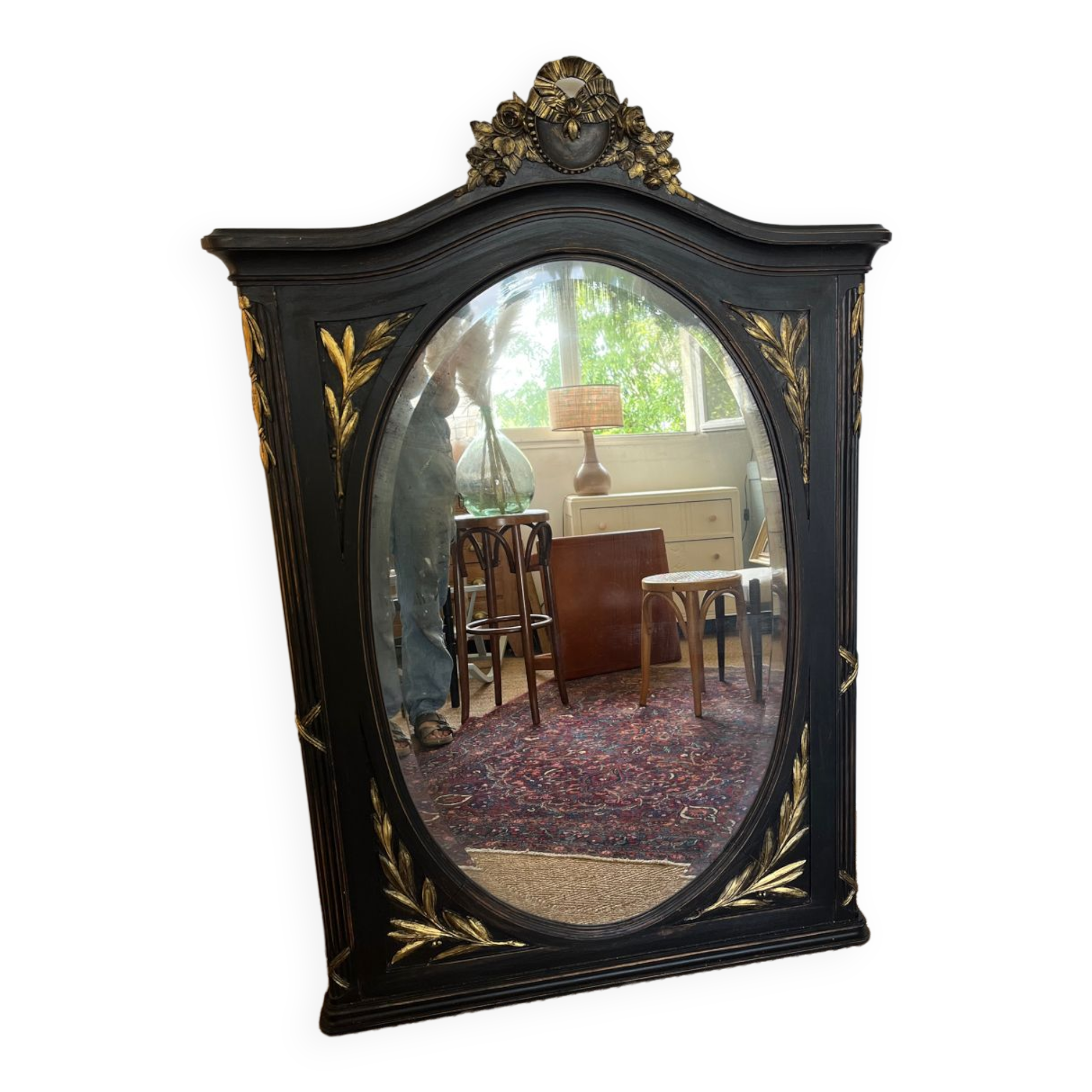 Large old trumeau mirror in black and gilded wood Napoleon style