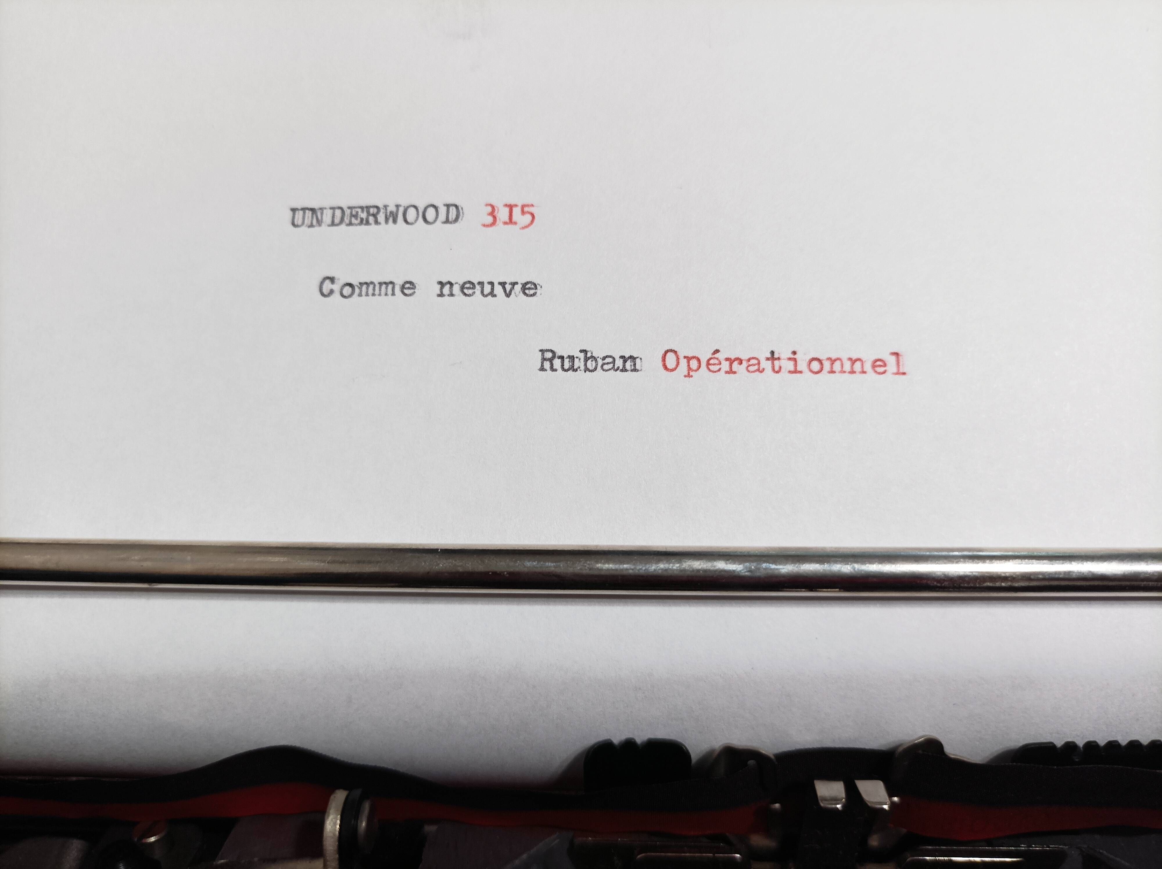 Underwood 315 portable blue typewriter with carrying case Like NEW
