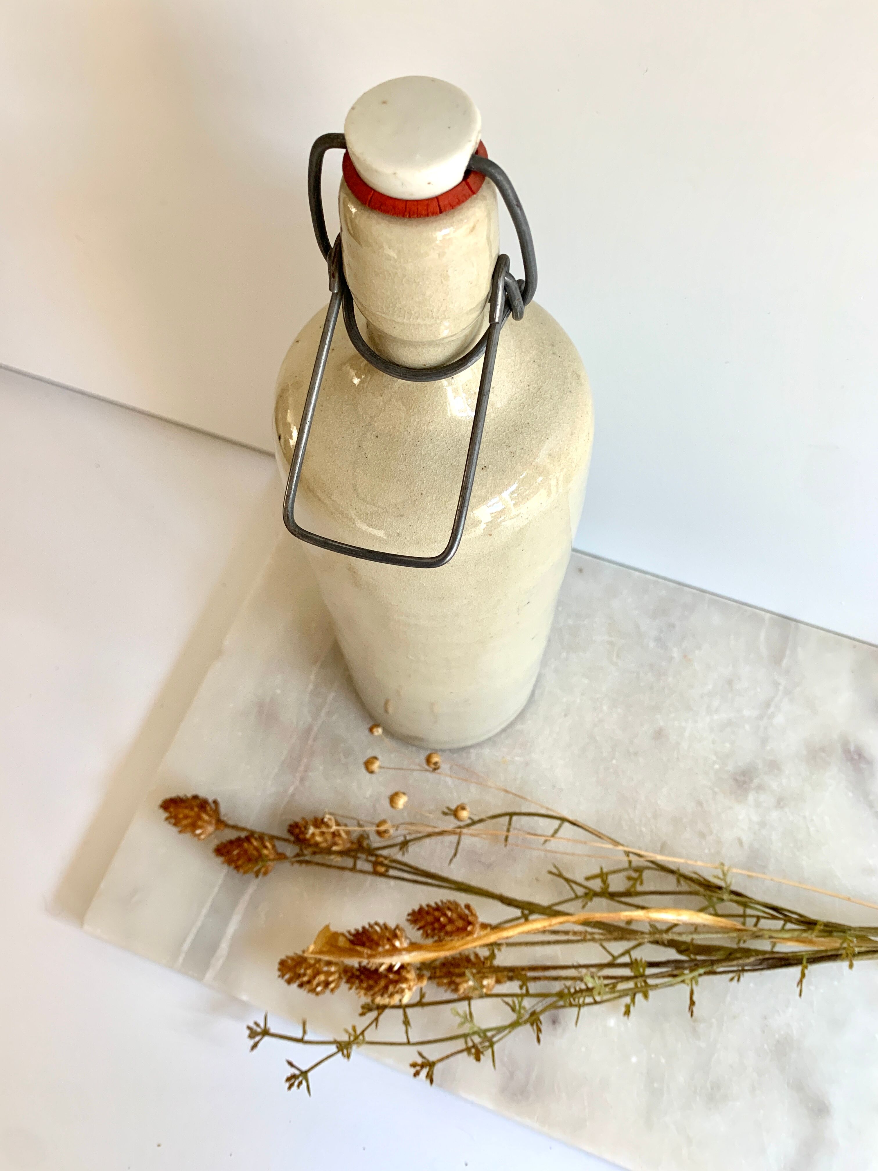 Bouteille en grès crème