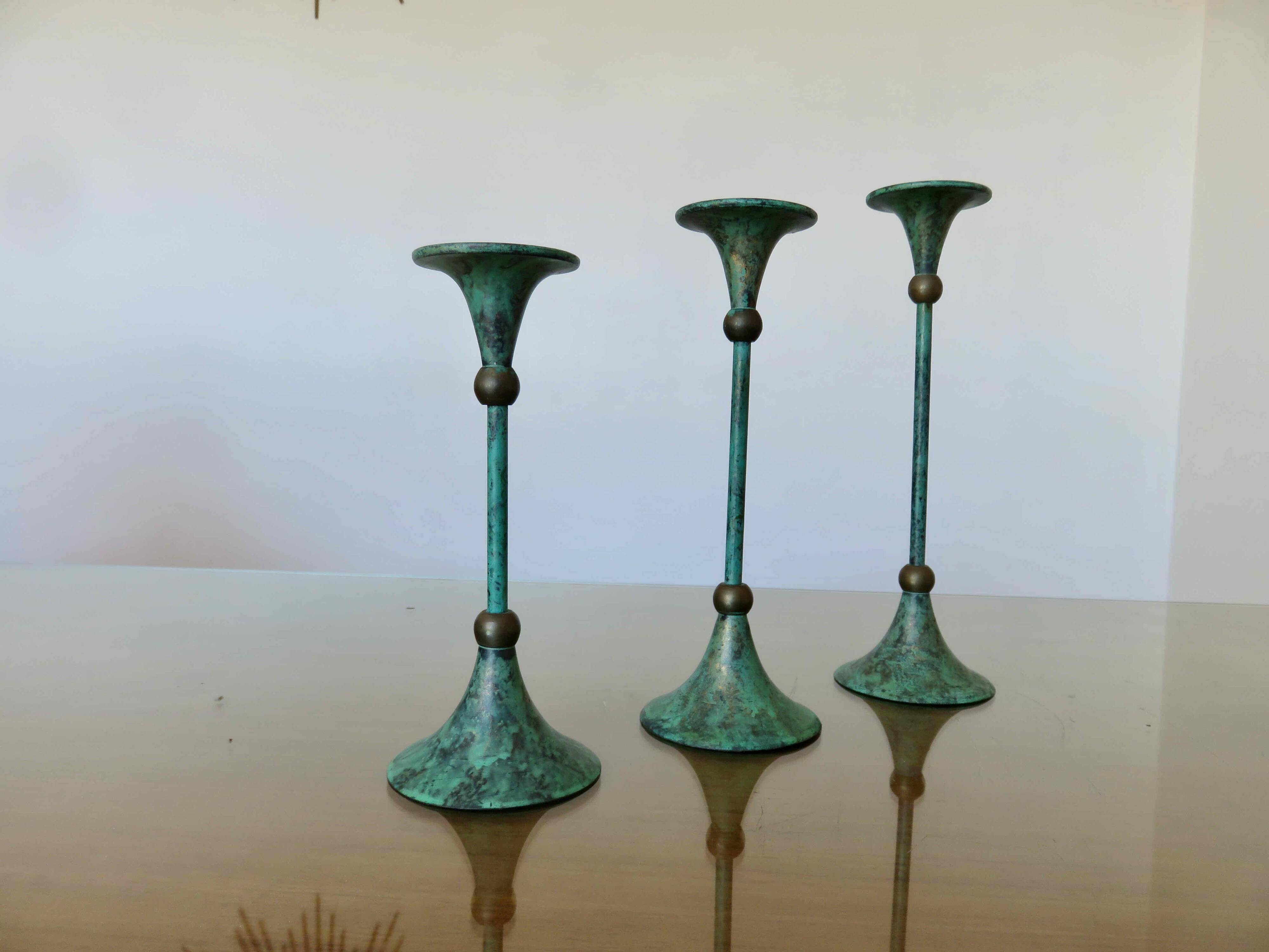 Series of 3 green tinted brass candlesticks from the 70s