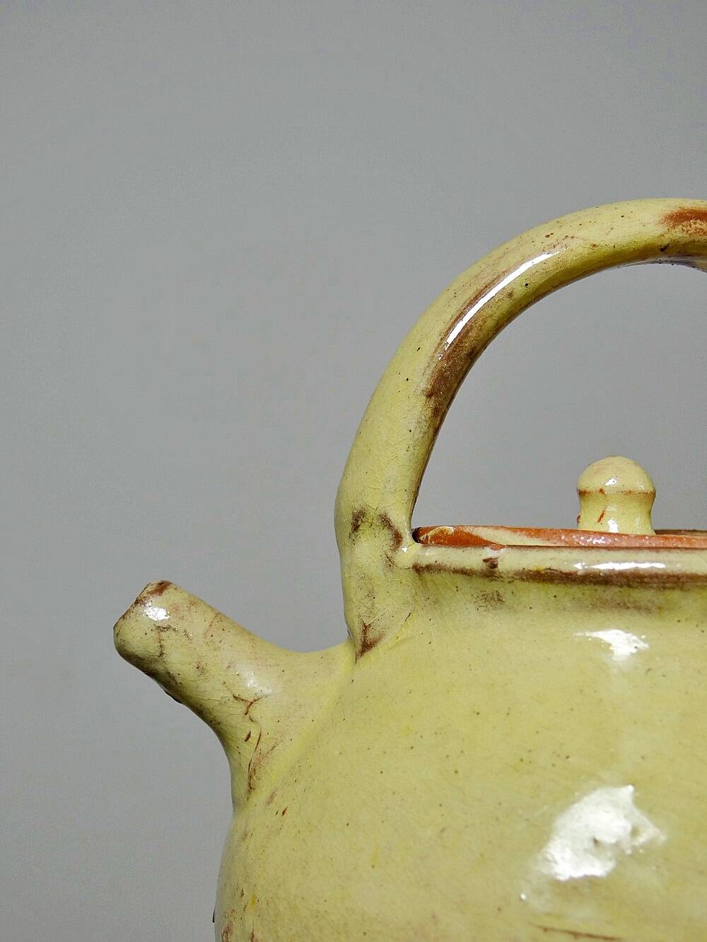 Small vintage pale yellow enamelled terracotta goat jug