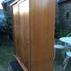 Vintage wardrobe with compass feet in oak and oak cp with 2 sliding doors.