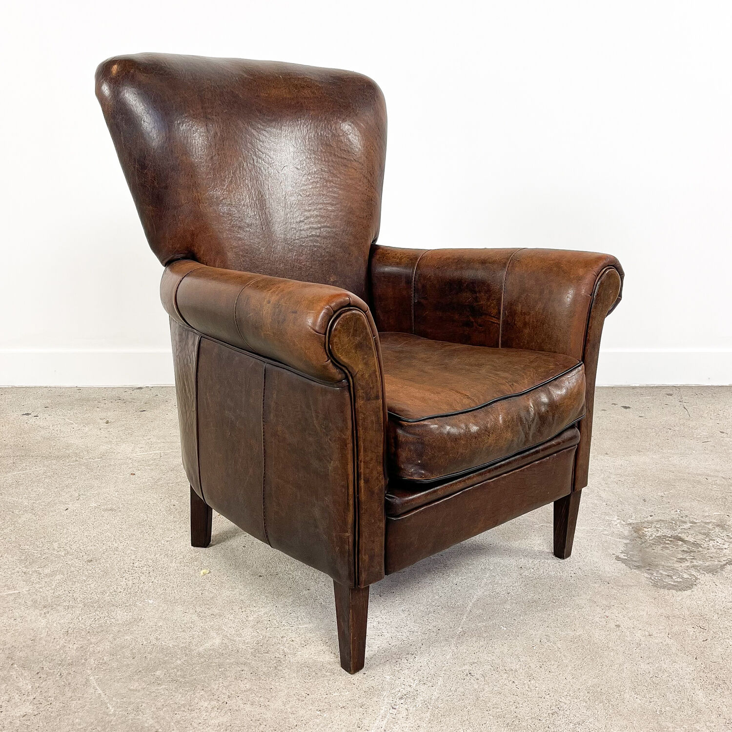 Vintage dark sheep leather club chair Achterdijk